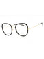02M2 00 - BLACK GOLD/Clear demo lens